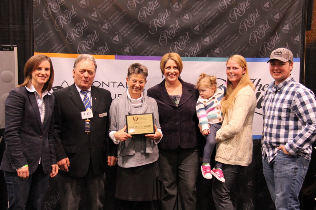 Hop Hill Stables was the recipient of the OEF/Just Add Horses Environmental Award. OEF president Allan Ehrlick (second from left) and BFL vice-president Sara Runnalls (fourth from left) present the award to Franny Jewett, Brenda Gallie, Kate Lane-Braithwaite, Kyle Braithwaite and their daughter, Aurora. 