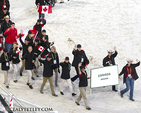 Team Canada proudly marches in the parade of nations on August 23 during the Opening Ceremonies of the Alltech FEI World Equestrian Games 2014 in Normandy, FRA. Photo by Cealy Tetley.
