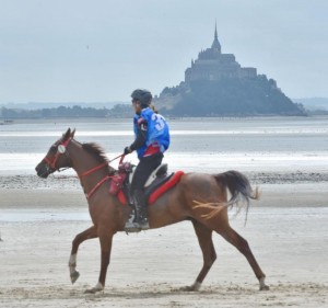  Jessica Manness and Greater Glide loping down the beach across from Bay of Mont Saint Michel. Diana De Rosa Photography. 