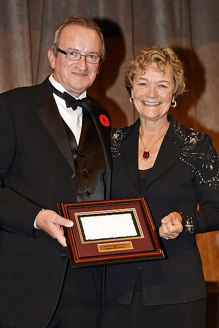 France "Fran" McAvity of Vancouver, B.C., receives the Jump Canada Volunteer of the Year Award for 2014 from Jump Canada Chair, John Taylor.