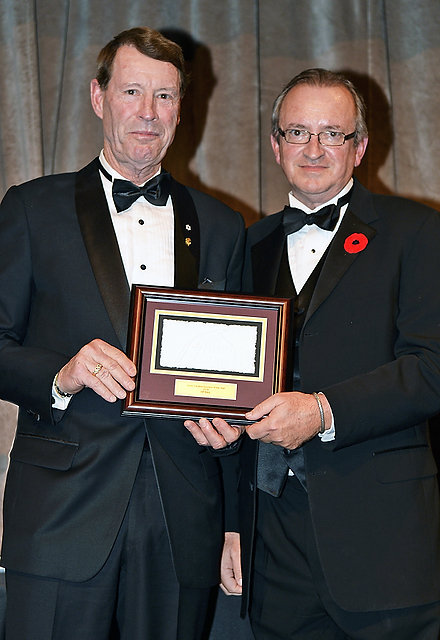 John Taylor presents Ian Millar, representing CP, with the 2014 Jump Canada Sponsor of the Year Award.